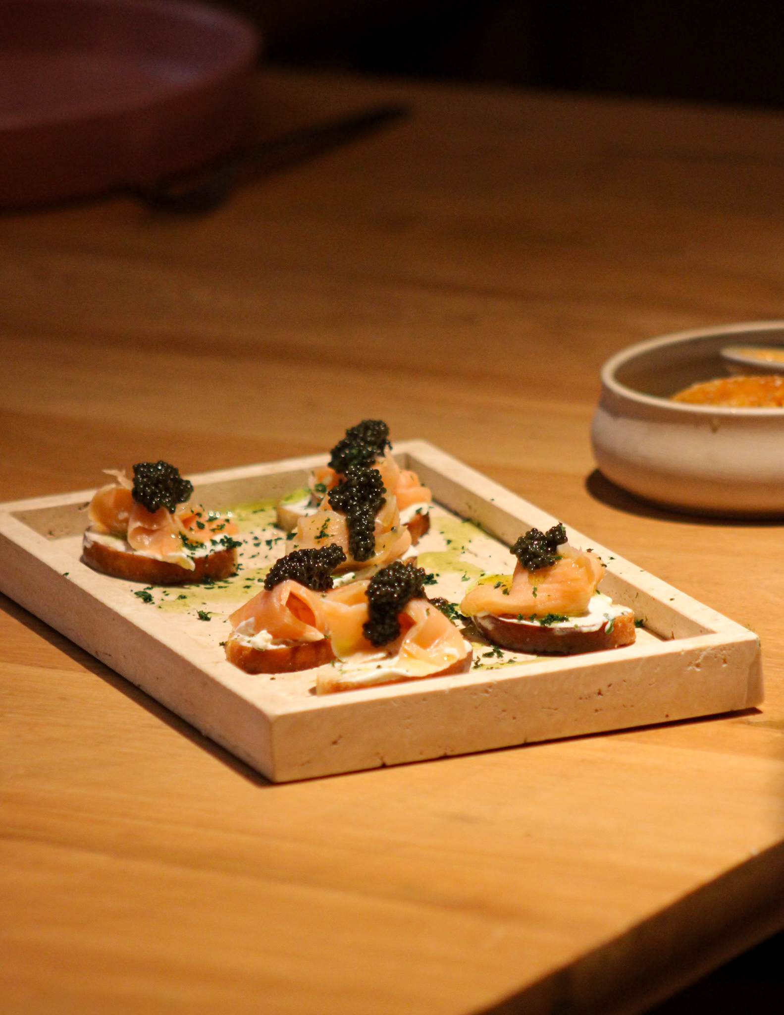 Salmon canapés prepared for a catered event